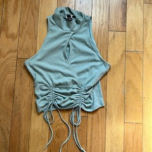 Pale blue cropped Windsor sleeveless blouse